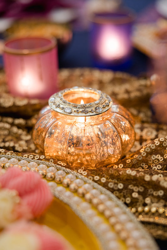 Tea Light Pumkin Holders available in Red, Silver and Gold