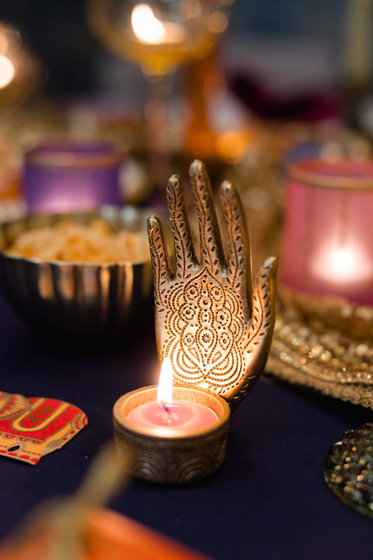 Handcrafted Brass Palm Tea Light Holder – Intricate Design